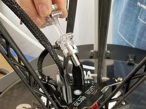 Screw in the Y Adapter assembly