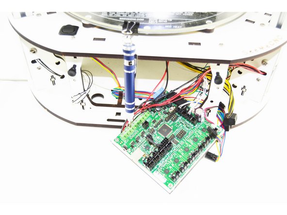 Loosen and remove ONLY the wire from the Fan 0 + terminal on the top of the RAMBo board.