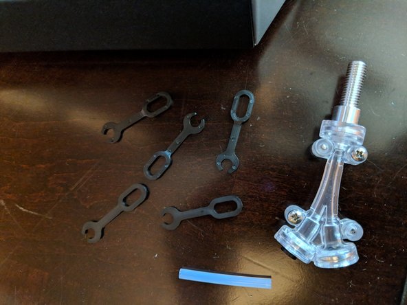 Locate the new PTFE liner that came in the kit. (Figure 1)