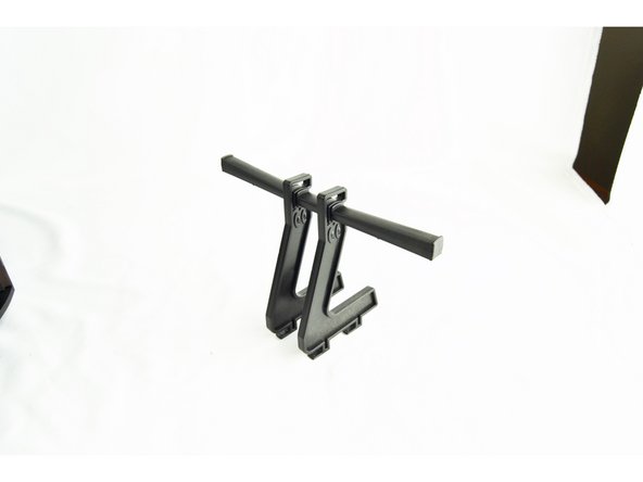 Assemble the spool holder as shown in the attached images.