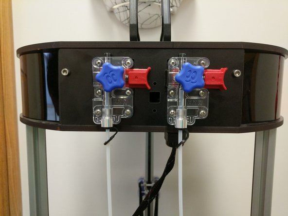 Using a utility or hobby knife blade, carefully cut a 100mm long section of ptfe tubing from the tubing provided.  Chamfer one edge of this 100mm long tube.  This is the end that goes into the dual feed adapter.  The other end of this 100mm section goes down and into the hotend.
