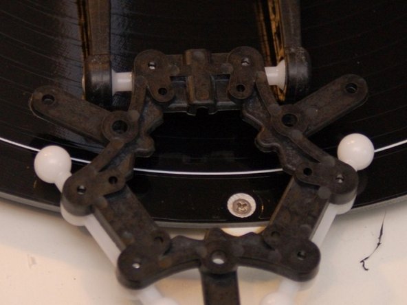 Attach the Ball Joint Platform you assembled previously to the other ends of the arms as shown.