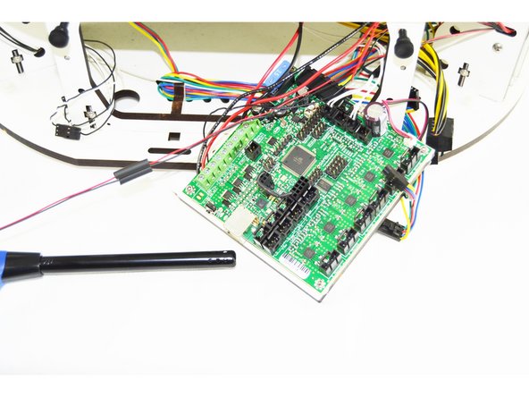 Slide the heat-shrink up over the connections that you soldered and heat it with a lighter.