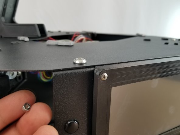 Let the 30318 M3 screws pass through the holes in the sheet metal, and use the 30321 M3 - .5 Nylon Lock Nuts to fasten the screen to the panel.