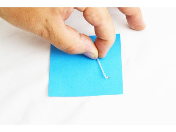 Make a 90 degree bend at the end of the thermistor / PTFE Tube (the end with the glass bead) using a pair of needle-nose pliers.