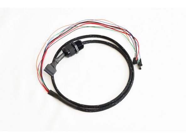 Slide the heat shrink tubing over the wire tie and  Pluggable 8 position Push-In Wire Terminal Plug as shown in the pic. Apply heat to the heat shrink tube to secure it in place. Use your preferred instrument. (if using an open flame such as a lighter, be sure not to hold the flame too long in one spot, as this will char the heat shrink tube)