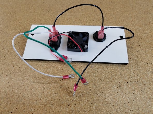Locate the 18awg green, white, and black wires shown.