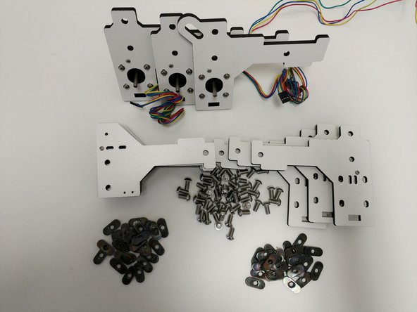 Locate the (50) 1/4-20 button-head machine screws and (50) TSLOT nuts.