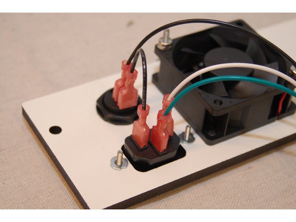 The red &amp; black wires for the cooling fan are connected to the first terminal in the V- and V+ sections as indicated by the blue arrows.
