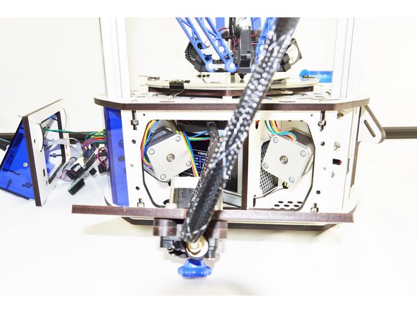 Once the thumb screws have been removed, lay the panel down on its side.