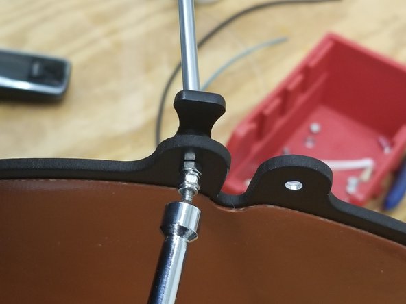 Install the three 58815 Build Plate Clamp for 3mm Boro Glass - Black as shown, using the 30308 M3 - .50 x 18mmL Phillip PH Machine Screw - SS, and three of the 30321 M3 - 0.50 Nylon Lock Nut - SS