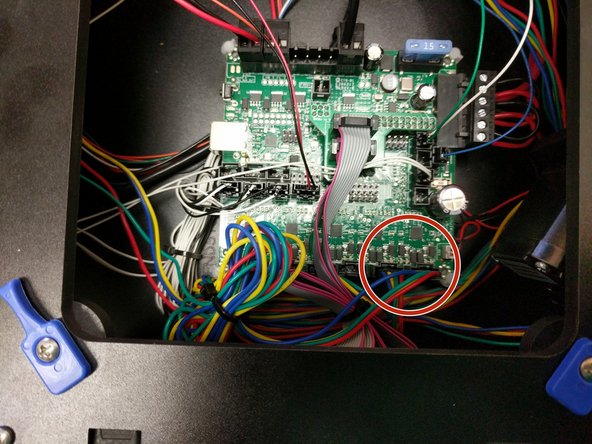 Route the new stepper motor wires as desired in the top frame of the printer.
