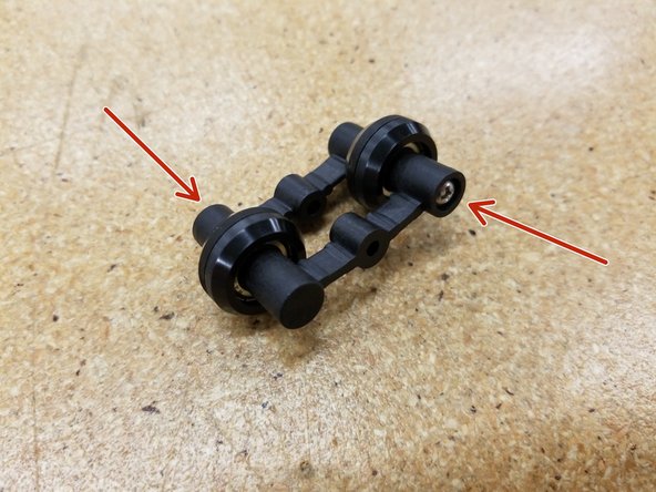 Use the supplied 30249 #4 x 1/2&quot; Philips Pan Head sheet metal screws  in both sides of the spring arms to secure the bearings in place. Make sure there's no gap and the two halves are fully seated and screwed together.