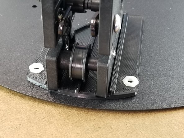 Place the nylon nuts in the shim plates as shown in Pic 2.