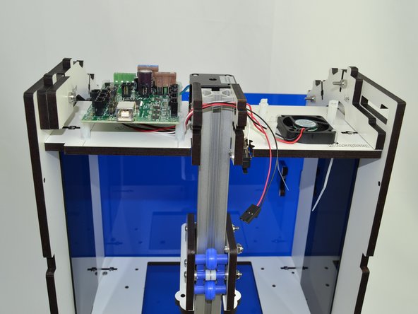 Slide the Mini-RAMBo board into position.