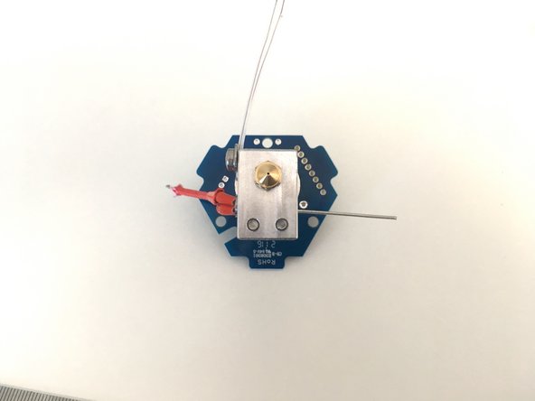 The black plastic ring of the EZR Struder / Hot End PTC Adapter should be on the side of the HE280 Hotend PCB Board with the 8 pin connector (See Pic)