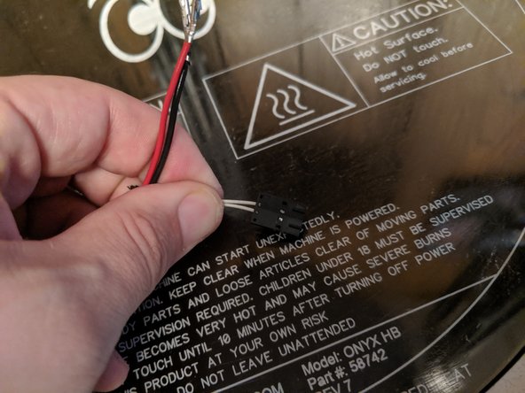 Now that the connectors are installed, we will remove the white thermistor wires from the plug. You will see in Pic 2 there are windows in the plug where you can see the connector on the inside.