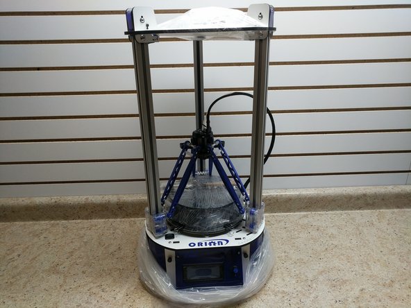 Remove the plastic bag that the printer is protected by.