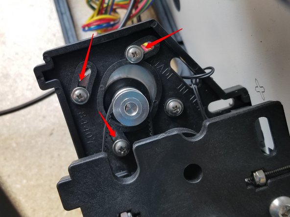 Rotate the stepper motor to the position shown in the photo. This location will give you the most available range of motion for tightening the belts after they are installed.