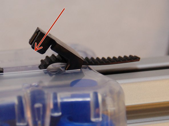 Install a belt clip. The two wider stanced legs will insert into the carriage first and then the belt clip can be pressed down to lock into place. If it is not wanting to lock, you may need to apply inward pressure on the closer stanced legs while pushing down to lock it in place.