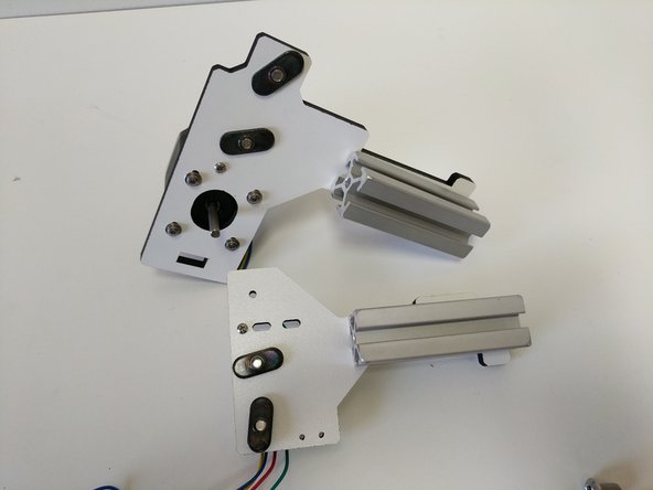 Locate the pack of (3)timing pulleys with set screws and the (6) 3.25&quot; TSLOT Pieces.