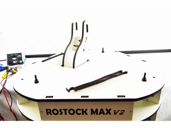 Re-install the top plate of the printer.