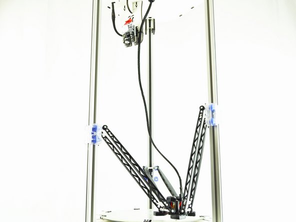 Secure the hotend whip to the extruder mounting panel with a cable tie.