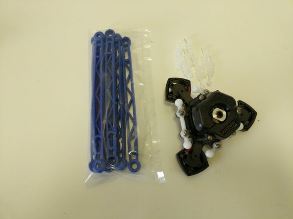 Locate the (6) Orion Arms (blue) and the (6) arm tension  springs. *** You must start with the blue Orion Delta arms even if you intend to print using the black Rostock Max Arms ***