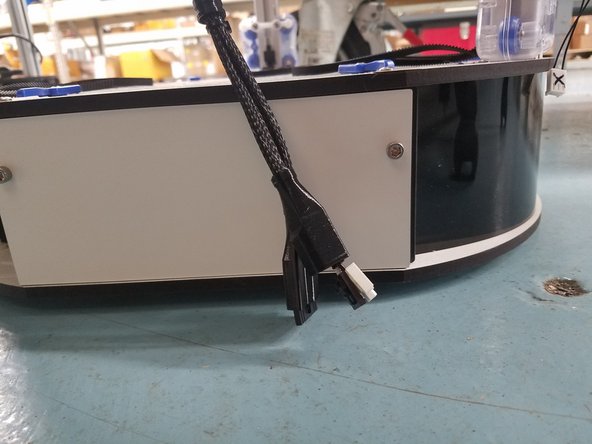 The Hot End connector end of the whip should almost reach the bottom of the enclosure when in the Cable Mount Hub.