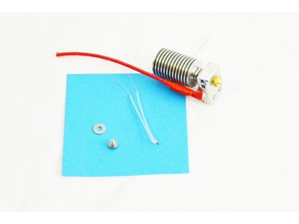 Locate the M3 -.5 x 6mm Phillips Head PH Machine Screw (30317) and the #4 SAE Flat Washer (30449)