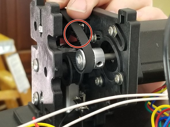 At this point check the tension in the belt between the idler and the motor gear.  If there is play in the belt or if when you move the carriage up and down, the belt seems loose or skips on the motor pulley, you will now tighten the belt and secure the motors in place.