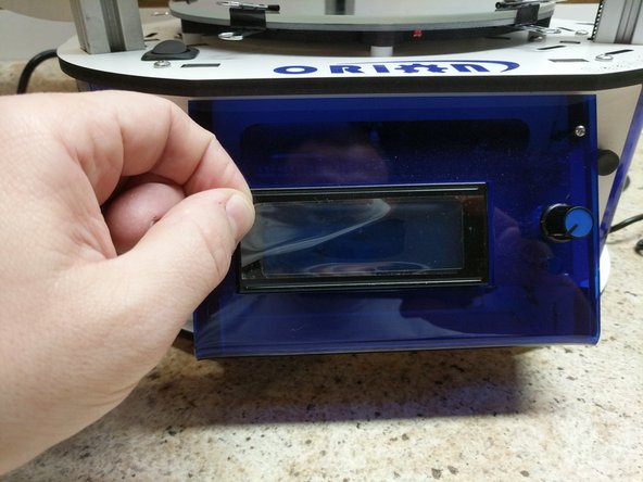 Remove the protective covering from the front of the LCD screen.