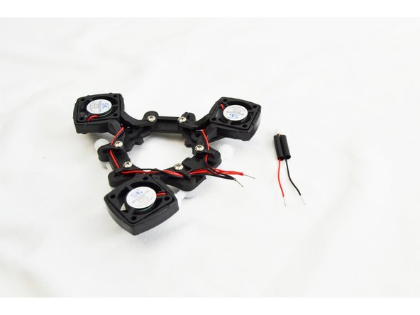 Cut the heat shrink tubing in half