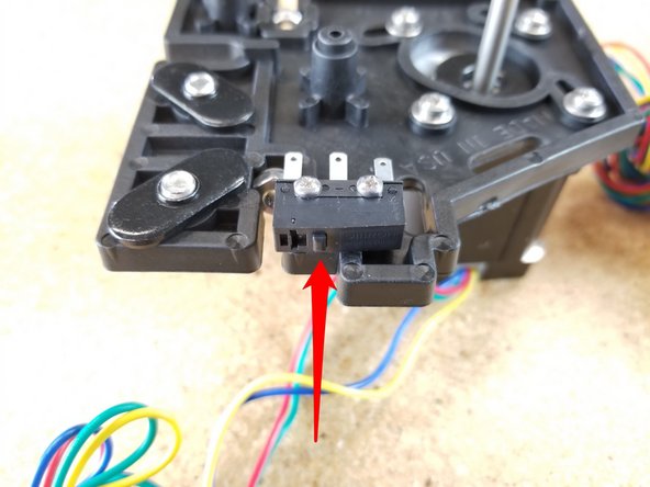 When installing the end stop switches, please make sure that they're oriented as shown in the photos. (The red arrow is indicating the &quot;button&quot; on the switch. It should be closest to the TSLOT hardware. Additionally, make sure that the endstop switches are level. This can best be done by pushing them up or down as you tighten the screws.