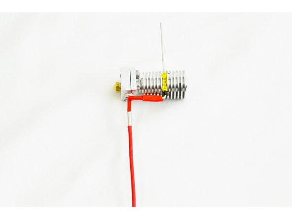 Slide the High Temp Fiberglass Insulated Wire (side with 10mm stripped, into the other end of the wire ferrule (inserted in the last step)