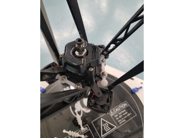 Now you can remove the Injection molded arms from the acetyl ball joints attached to the Hot End.