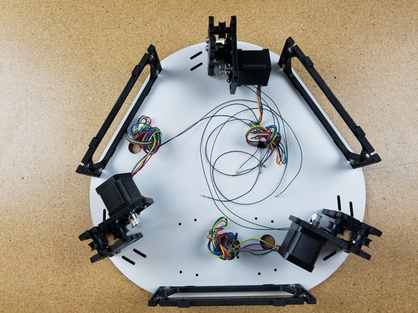 The upper assembly base plate has laser cut engraving on it that indicate the X, Y, and Z tower locations. Be sure to put that faced up towards you and away from your work surface.