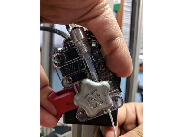 You can load filament by heating the hot end up to 220 degrees and manually feeding the filament in through the EZR and boden tube, or by using the &quot;Filament Load&quot; macro