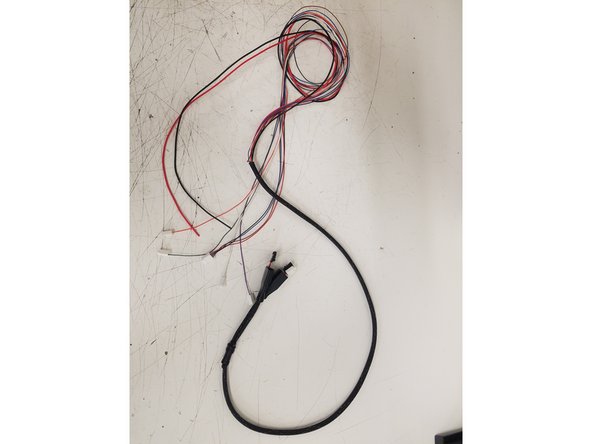 Begin by unscrewing the bottom part of the Cable Mount Hub and threading all the wires from the SE300Whip through it.