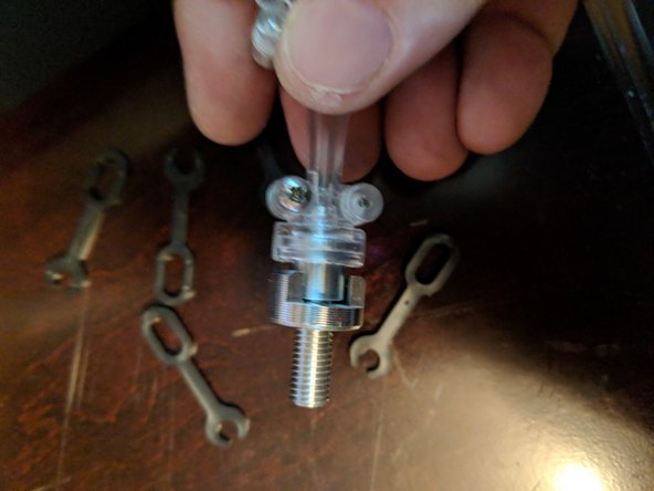 Locate the 2 into 1 adapter and the locking collar from the kit.