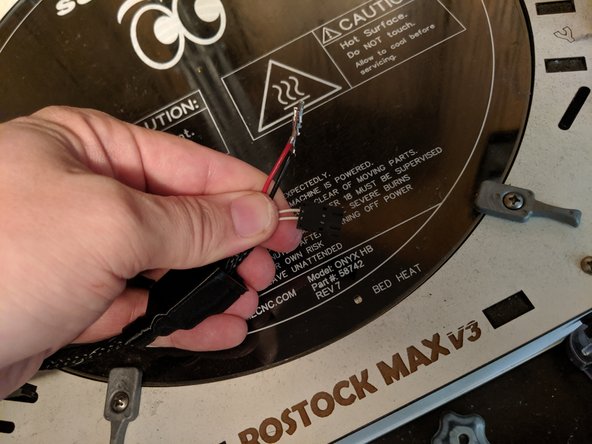 Insert the white wires into the connector in the 2 middle pins as they were located before removal.  Polarity does not matter