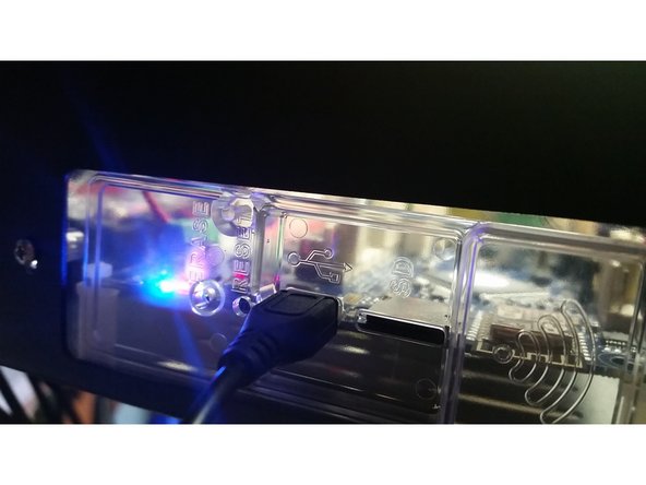 Plug the micro USB cable into the USB slot on the (top) left side of your printer.