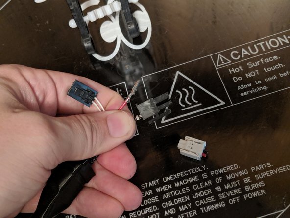 Note that the black wire goes into the position next to the tab and the red wire goes on the opposite side! Polarity is important!