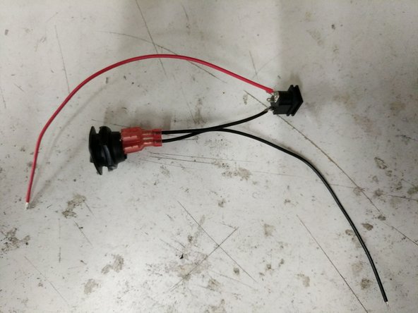 Connect the spade terminals to the rocker switch.