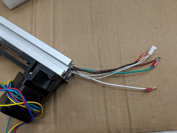 The first set of wires to feed in the Z Tower are the 18awg wires. These are the thicker wires from the Z Tower Wire Pack. Please ensure to have them oriented the correct way.