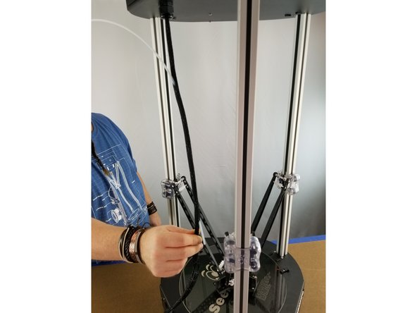 Manually lower the hotend to the center of the bed all the way down.