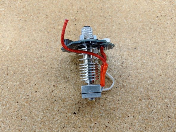 Route the second heater cartridge lead as shown.