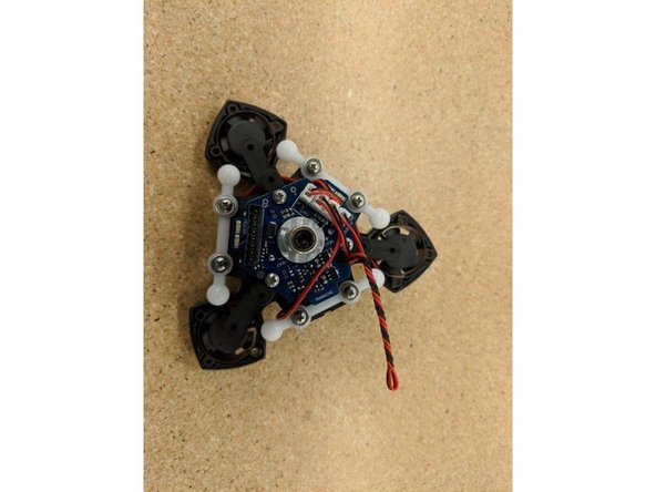 Wrap this spindled fan wire around the PTC Locking Adapter as shown.