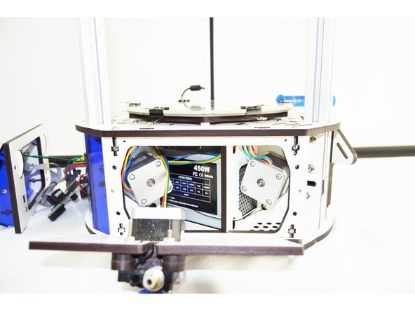 With the bowden tube all 6 arms removed, the effector and whip are now be completely removable from the printer. Remove it and set it aside.