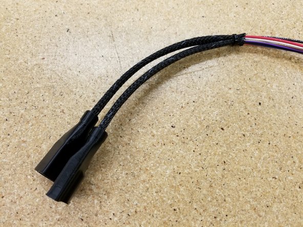 Zip tie the two cable bundles together at the top of the mesh looms as shown.